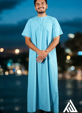 Stay cool and modest in TheTopiWala’s Aqua Blue Short Sleeves Thobe – A Sunnah-inspired jubbah that’s perfect for Ramadan, ISNA 2024, and special occasions.