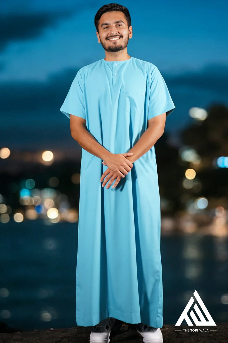 Stay cool and modest in TheTopiWala’s Aqua Blue Short Sleeves Thobe – A Sunnah-inspired jubbah that’s perfect for Ramadan, ISNA 2024, and special occasions.