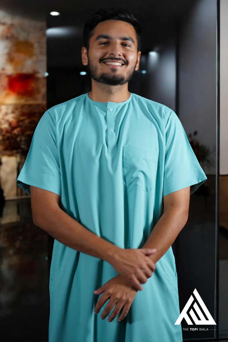 Celebrate your faith with the Light Green Short Sleeves Thobe from TheTopiWala – A versatile and comfortable jubbah for all Islamic events.