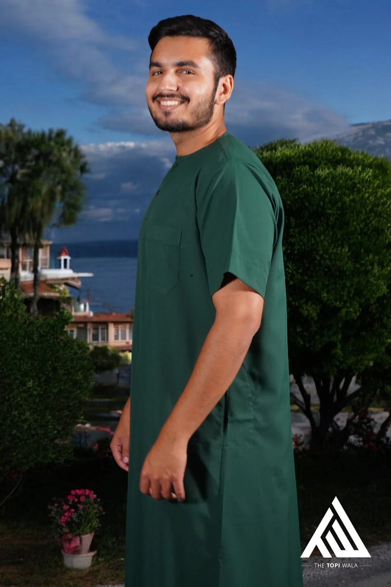 Top-quality adult thobe in dark green from TheTopiWala.com – Choose TheTopiWala.com for Islamic clothing that reflects elegance and modesty, including our dark green thobe perfect for everyday or prayer wear. Buy topi/hat/prayer cap for adults & kids to looks beautiful.