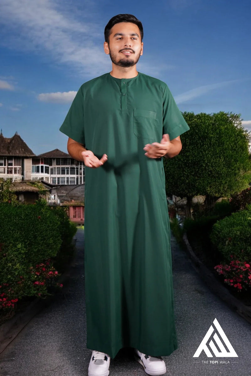 Shop dark green thobes for adults – TheTopiWala.com Islamic fashion – Enhance your Islamic wardrobe with TheTopiWala.com’s premium adult thobes/jubbah and kufis/topis, crafted for style, comfort, and modesty.
